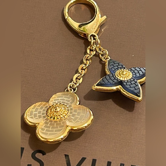 Louis Vuitton Handbags - Authentic Louis Vuitton bag charm in blue & white LV flower pattern. Mint.